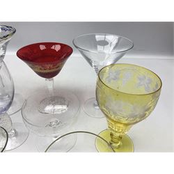 Collection of glass ware comprising two 1970s Murano cocktail glasses, one enamelled, 1970s Murano tall wine glass, late Victorian amber rummer with grapevine engraved decoration, Art deco neodymium wine glass, Edwardian etched champagne coupe, Art deco conical cocktail glass with silvered rim, pair of Art Deco champagne coupes with gilded rims, 1970s tall pain stem cocktail glass, 1960s small iridescent cocktail sherry