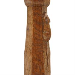 Mouseman - mid-20th century adzed oak joint stool, dished oak seat, on shaped octagonal supports joined by box stretcher, with carved mouse signature, by the workshop of Robert Thompson of Kilburn