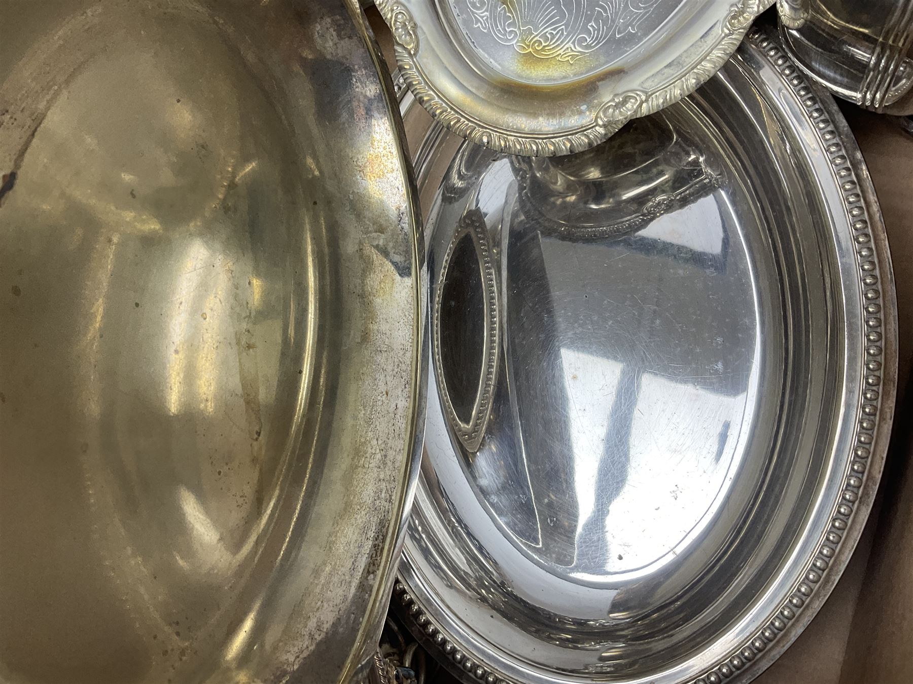 Quantity of silver plate and other metal ware, including sugar caster, tureens, serving dishes, pair of candelabra etc, in two boxes 