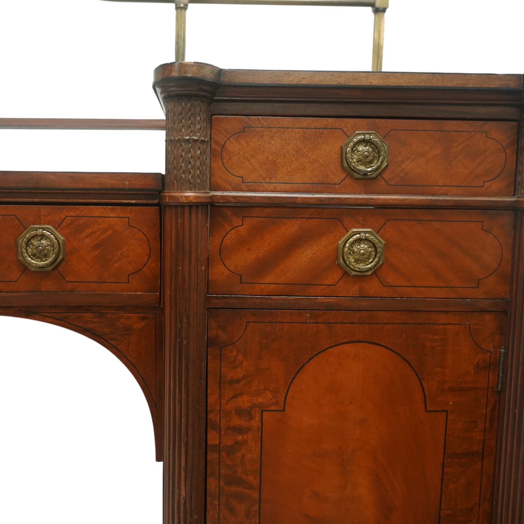 19th century mahogany Hepplewhite design pedestal sideboard or pair of bedside pedestals, each pedestal fitted with two drawers and cupboard, decorated with figured panelled doors and ebony stringing, curled leaf carved mounts over reeded half columns, on turned feet 