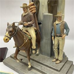 Beswick matte Hereford Bull, with stamped mark beneath, on wooden plinth, together with a limited edition Bradford Exchange John Wayne model, tallest H36cm