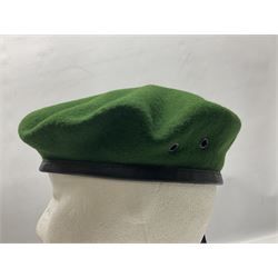 Four paratrooper berets - Russian, Italian, British and Foreign Legion; all with badges (4)