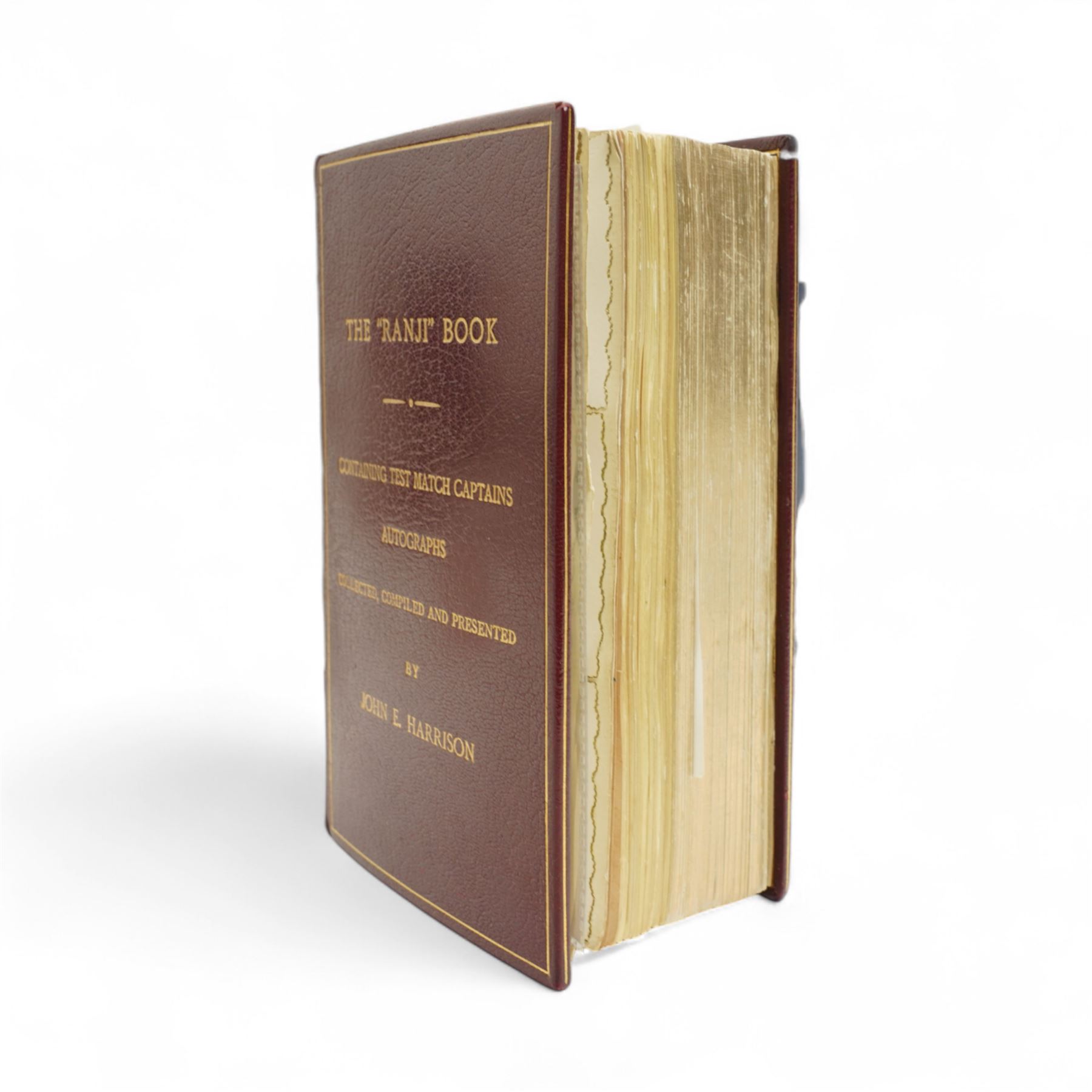 K S Ranjitsinhi - Jubilee Book of Cricket 1897, rebound in full calf and incorporating approximately 250 autographs of international cricketers, collected, compiled and presented by John E Harrison, all edges gilt together with a folder of correspondence, birthday card from Don Bradman, cuttings and autographs etc and a small album of photographs and correspondence