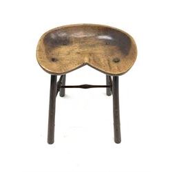 18th/19th century beech saddle stool, dished kidney shaped seat on tapered supports joined by turned H shaped stretchers