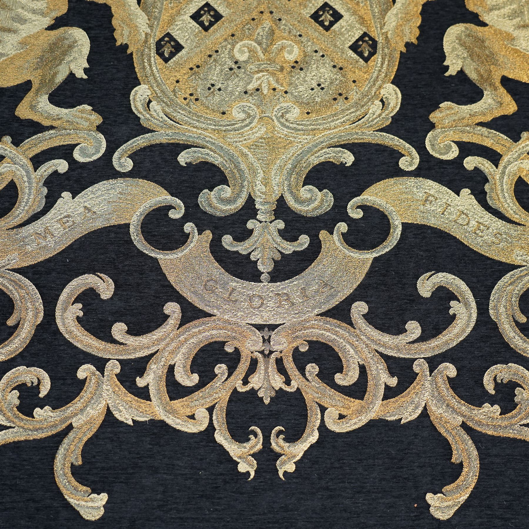 Large heraldic wall hanging, decorated with gilt threads, the central coat of arms over Latin motto 'Mea Gloria Fides' or 'Faith is my Glory',  174cm x 255cm