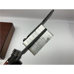 Three modern bullet moulds comprising Lee double cavity .44 calibre, boxed with instructions; and two Lyman .38 calibre; all in unrelated 19th century mahogany box