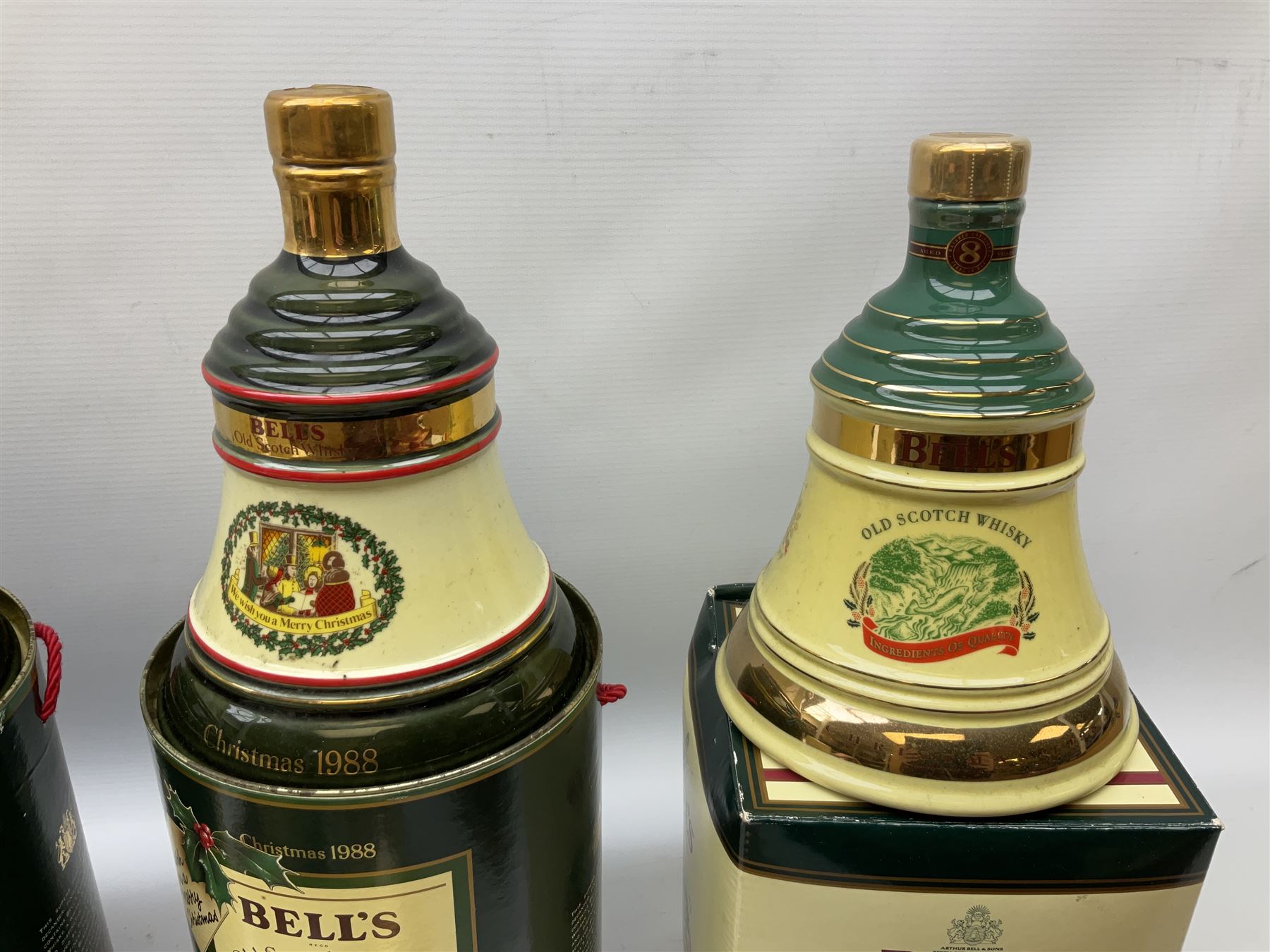 Six Bell's Old Scotch Whisky Christmas ceramic decanters comprising 1988, 1989, 1992, 1996, 1997 and 1998 all in original boxes and decanter seals intact 