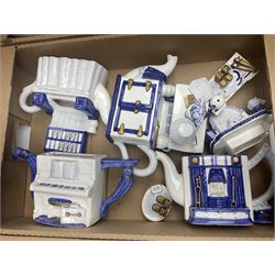 Commemorative ware, including mugs, shots glasses, plates and book etc, together with a ceramic shire horse and wooden cart, four Leonardo blue and white tea pots, and a collection of other ceramics and glassware, in three boxes 