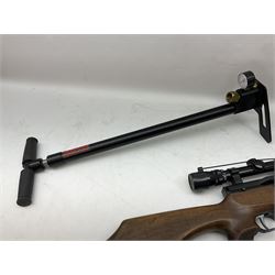 Weihrauch HW100 .22 calibre PCP repeating air rifle; walnut thumbhole stock with textured pistol-grip; Nikko Stirling Silver Crown 3-9x40 telescopic sight; integral sound moderator; No.1901181 L99cm overall; in gun sling; with Logun Combi-Pump and quantity of pellets