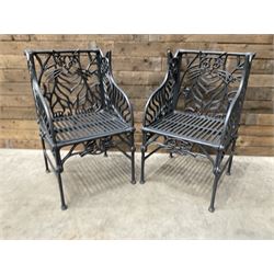 Richard Bawden (1936-2024): Pair of Cat design painted cast iron garden armchairs