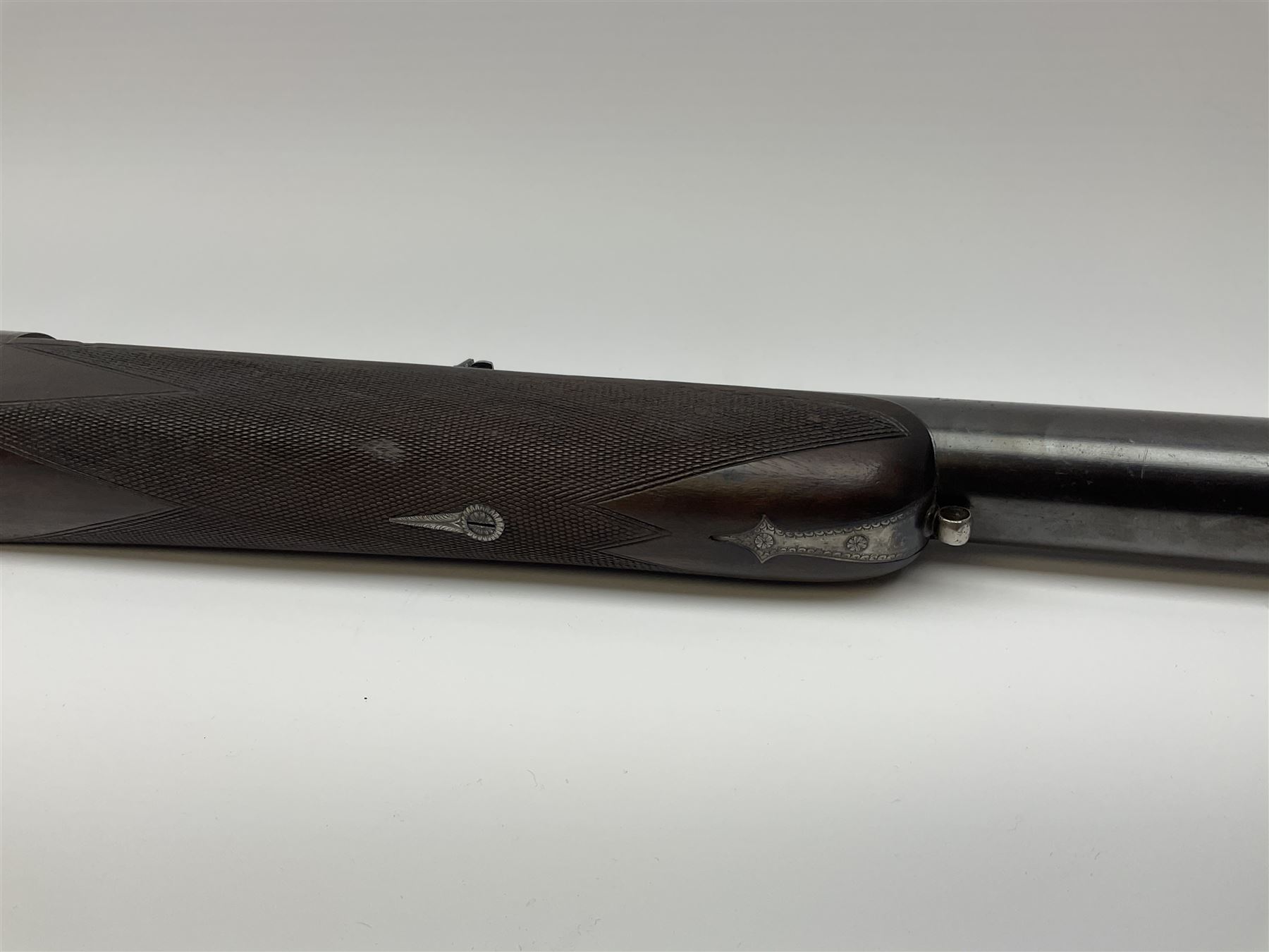 Rare Henry Pieper Liege seven-chambered solid barrel 297/30 calibre rim-fire volley gun with six barrels around a central seventh barrel drilled for simultaneous fire, built on a Remington type rolling block action, blued 62cm barrel with raised rib and twin rear leaf sights, case hardened action complete with loading plate for seven cartridges, walnut stock with chequered pistol grip and fore-end and inset 'silver' cartouche with two Chinese type characters, no.256PLN, L109cm overall
