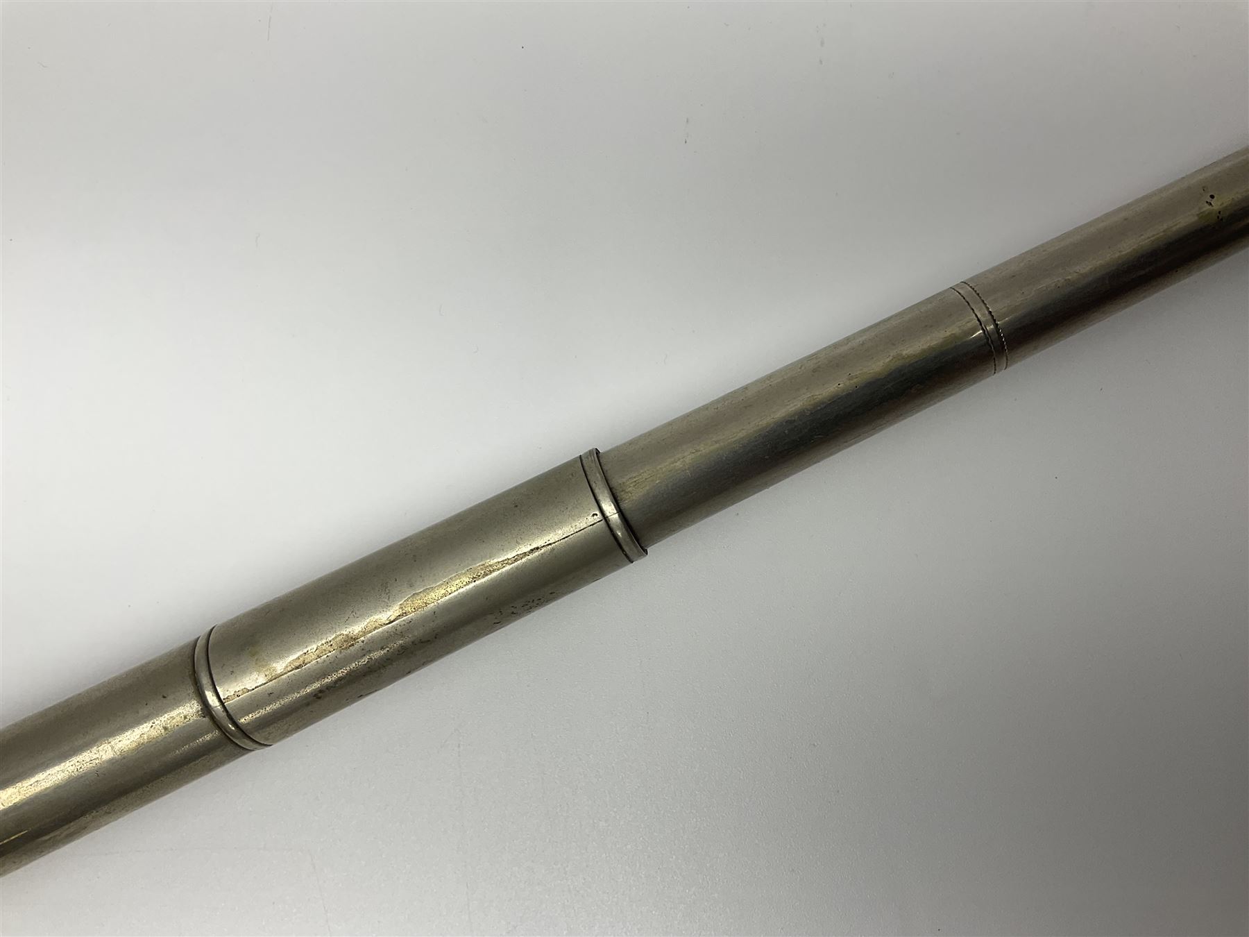 19th century telescopic hunting horn, the bell engraved 'The Beaufort', with makers mark Kohler & Son, makers, 61 Victoria Street, Westminster (from Covent garden) London, in a leather sheath, horn full extended L91cm 