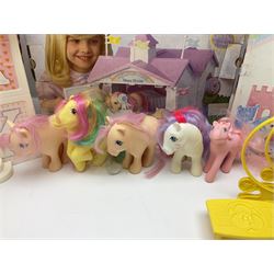 1980s Hasbro My Little Pony - Dream Castle and Show Stable; both boxed, together with Lullaby Nursery and Carry Case; ten generation one ponies, including Majesty, Skydancer and Locket; and assorted accessories 