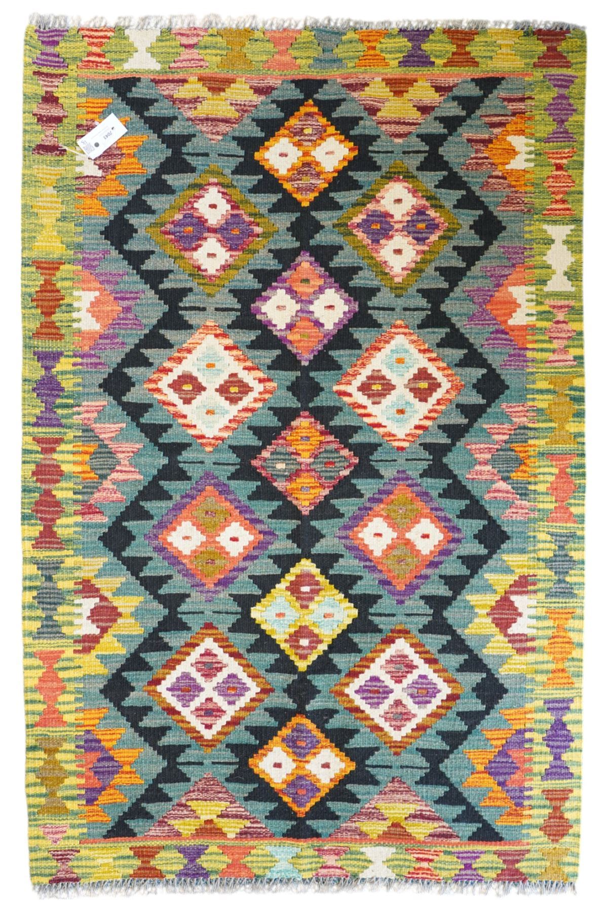 Maimana Kilim rug in shades of green, decorated with stepped lozenges 