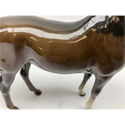 Seven Beswick figures of horses, including Connemara pony in grey no.1641, Arab in bay no.1265, large foal in grey no.947 etc, together with a Goebel figure of a horse (8)