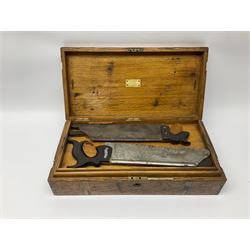Naval doctor's surgical instruments, contained in a converted brass bound oak pistol box, the hinged lid opening to reveal two removable fitted trays, containing 19th century and later saws, scalpels, tweezers etc