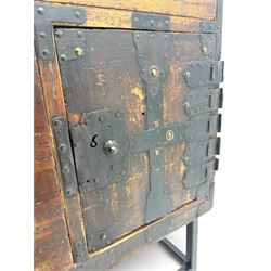Late 19th century Japanese tansu chest, crafted with a cedar frame and cypress wood panels, original iron fittings throughout, comprising a single long drawer above smaller drawer and hinged cupboard door enclosing two smaller internal drawers and storage compartment, mounted on a bespoke black metal stand