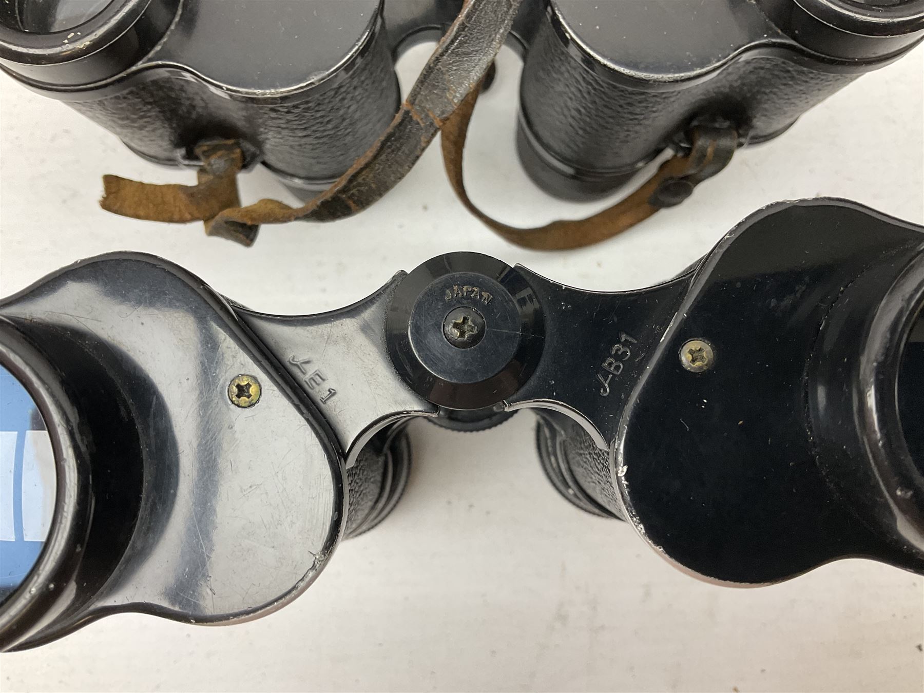 Twelve pairs of binoculars to include BWCF 7x35 Extra Wide Angle, Carl Zeiss Jena Delturis 8x24, Carl Zeiss Jena Jenoptem 8x30W, Chinon Countryman 10x50,  Ajax 8x30, Regent 16x50, etc,  some with cases