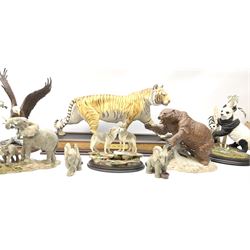 Three Franklin Mint figures, first example On The Prowl, on wooden stand H32cm, L63.5cm, Grizzly, H23cm and American Majesty by Ronald Van Ruyckevelt H37cm, together with five other figures.  