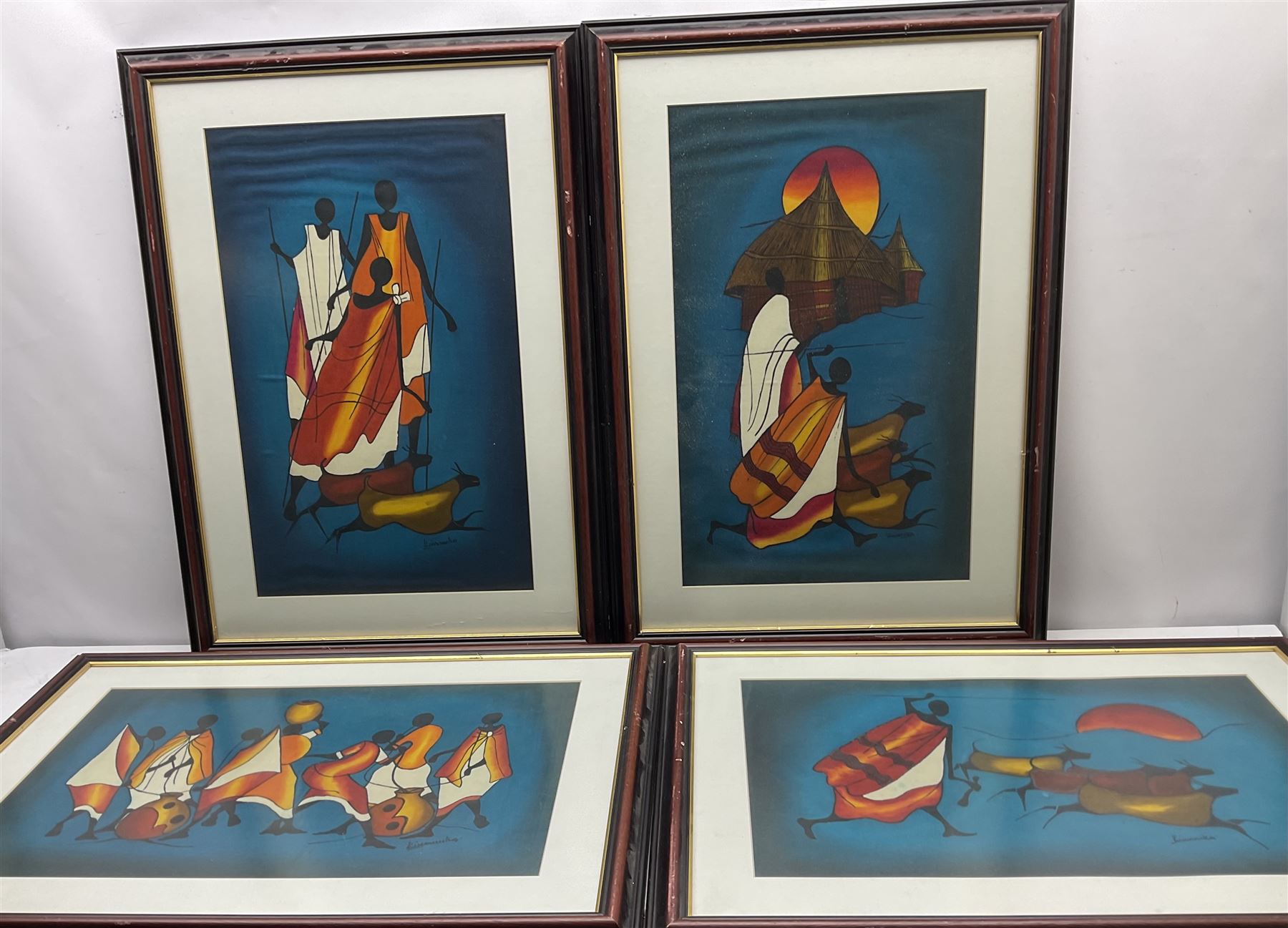 Kiwanuka (African 20th century): Tribal Scenes, set four watercolours on fabric signed 38cm x 61cm (4)