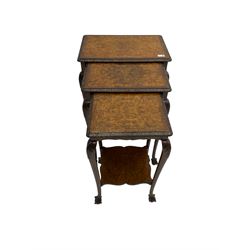 Mid-20th century figured walnut nest of three tables, rectangular tops with foliate moulded edge, on acanthus carved cabriole supports with ball and claw feet, the smallest with undertier 