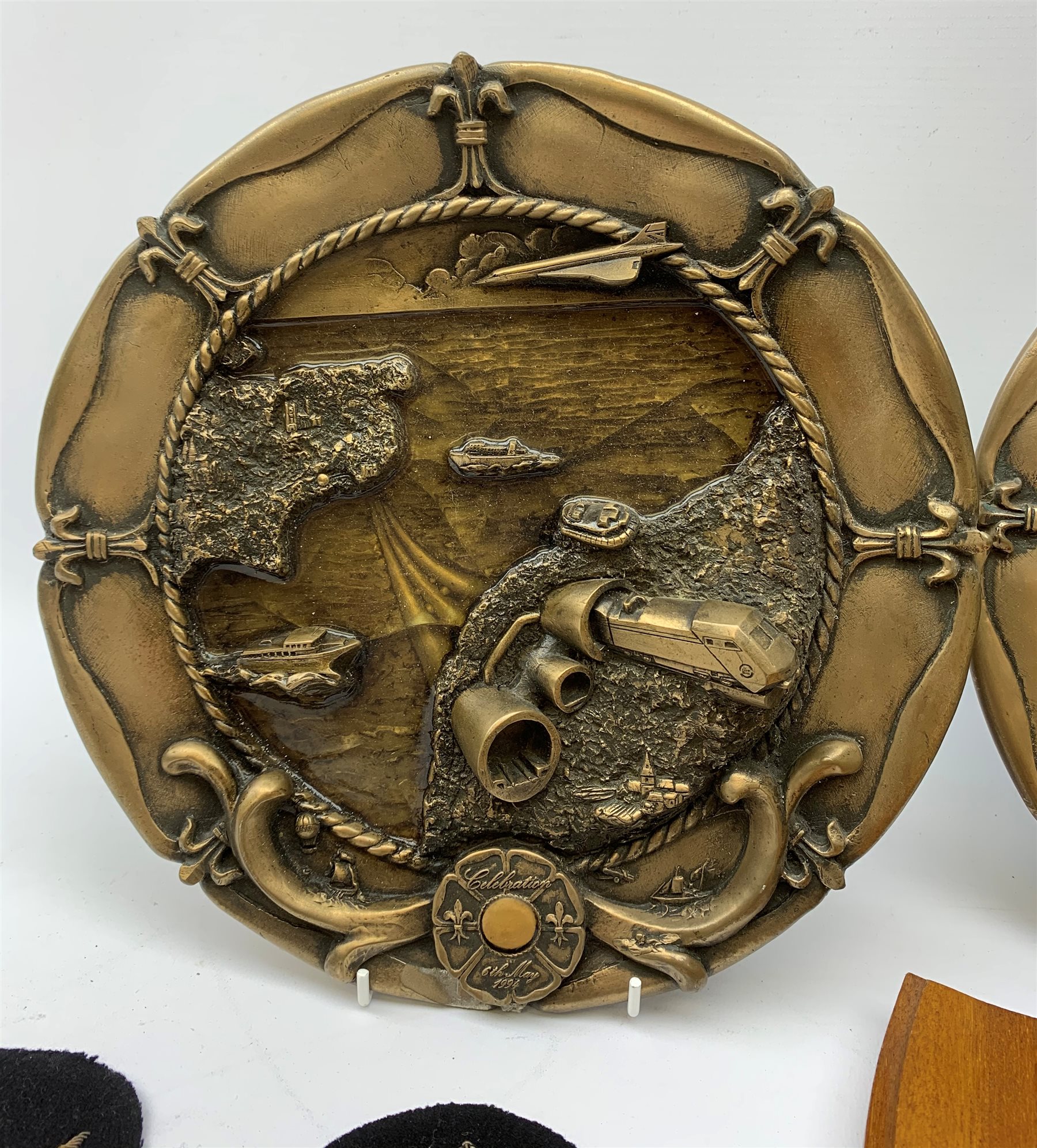  Two Submarine Force US Atlantic Fleet presentation plaques, the first detailed Subron 14, the second USS Abraham Lincoln 602, each H32.5cm, together with five uniform patches, four cap tallies, detailed HSM Tamar (x3), and HMS Ganges, and a set of two limited edition Euro Tunnel commemorative presentation plaques, The Breakthrough 1st December 1990 and Celebration 6th May 1994, D27cm, complete with original certificates.  