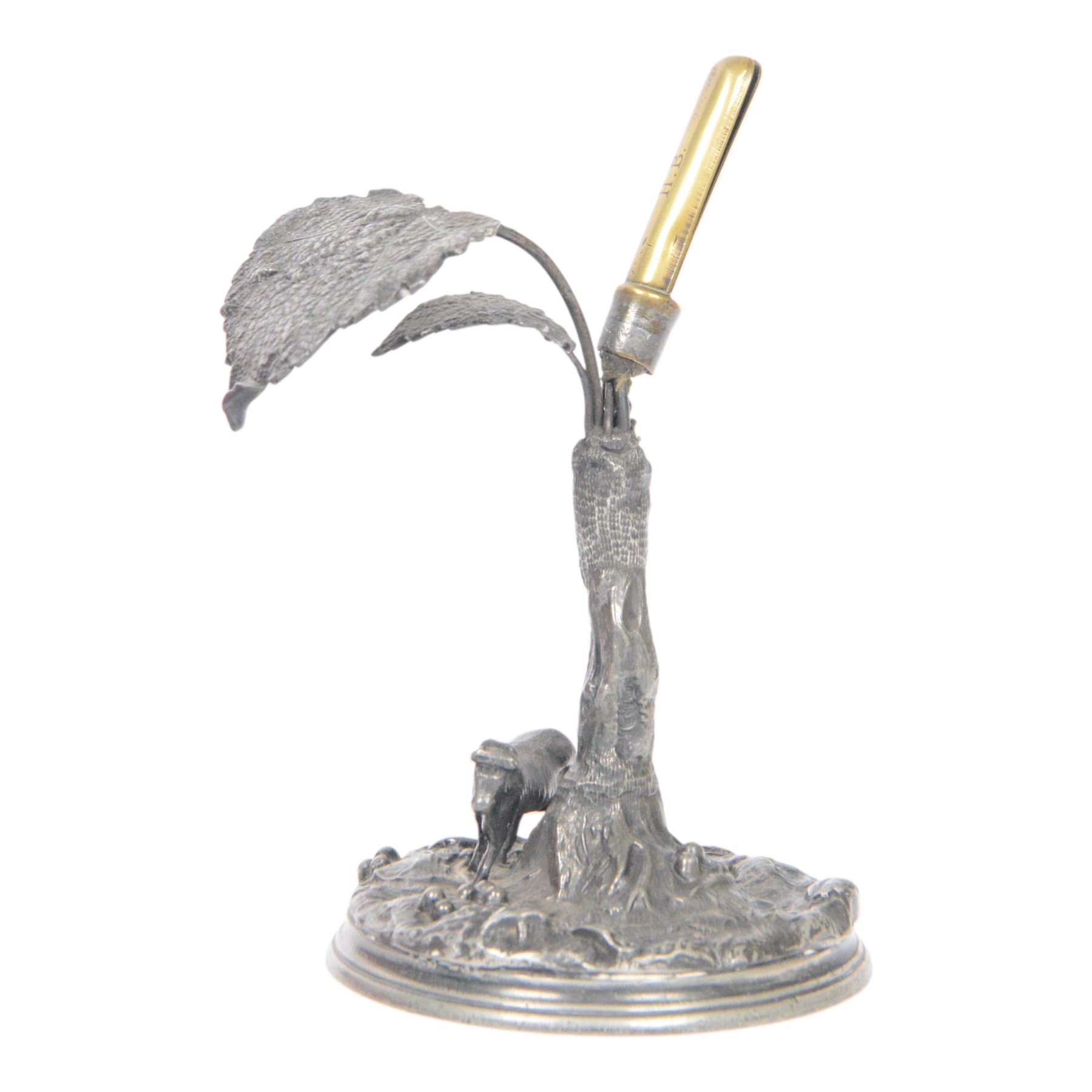 19th century silver plated desk holder, the circular naturalistically modelled base cast with fruiting vines and with applied figure of a ram, rising to a vine with two leaves, and initialled brass clip, H18cm
