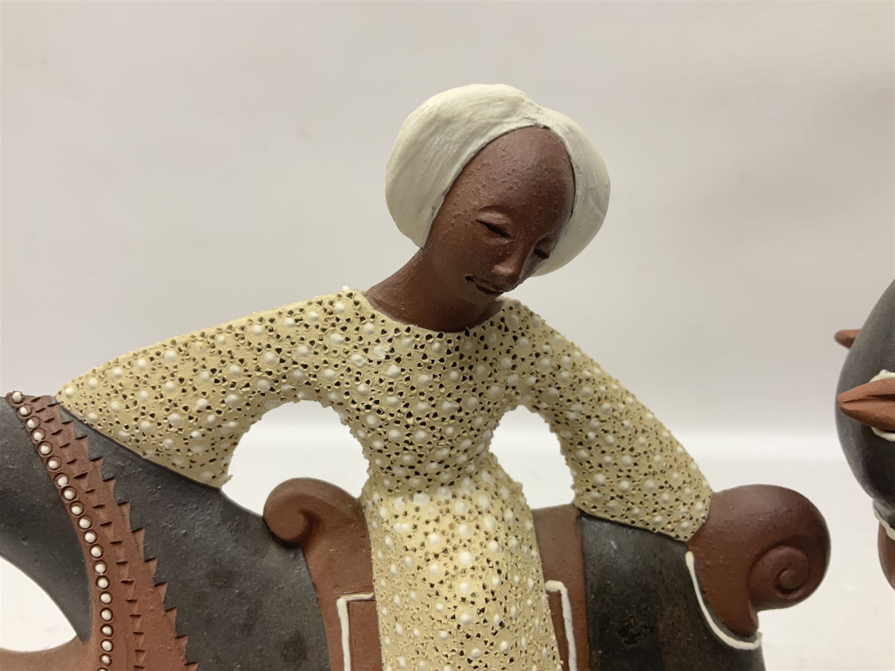 Leonard Stockley; two studio pottery figures modelled as a king and queen upon horses, both signed beneath,  H25cm