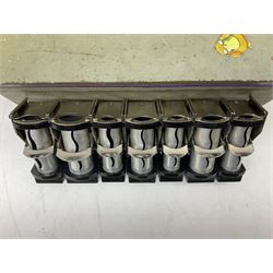 Bell Punch Company of London 'The Ultimate' five lever fare collection machine, together with an Almex ticket machine with shoulder strap, two brass Halifax transport cap badges, other chrome tramway cap badges, etc