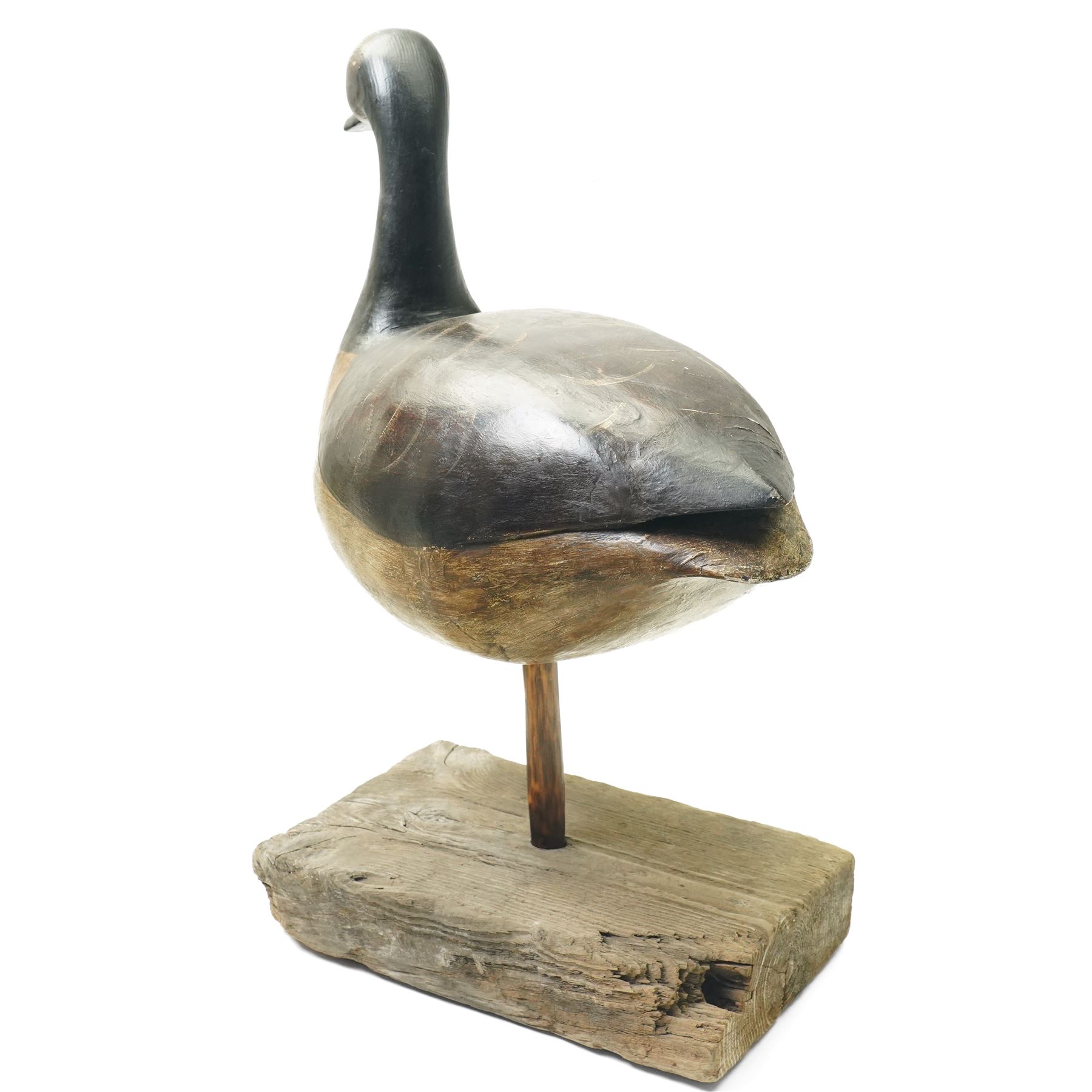 Guy Taplin (British 1939-): 'Canada Goose', carved and polychrome painted wooden sculpture of a bird, on a naturalistic driftwood base, H64cm
Provenance: purchased directly from the artist in the 1990s