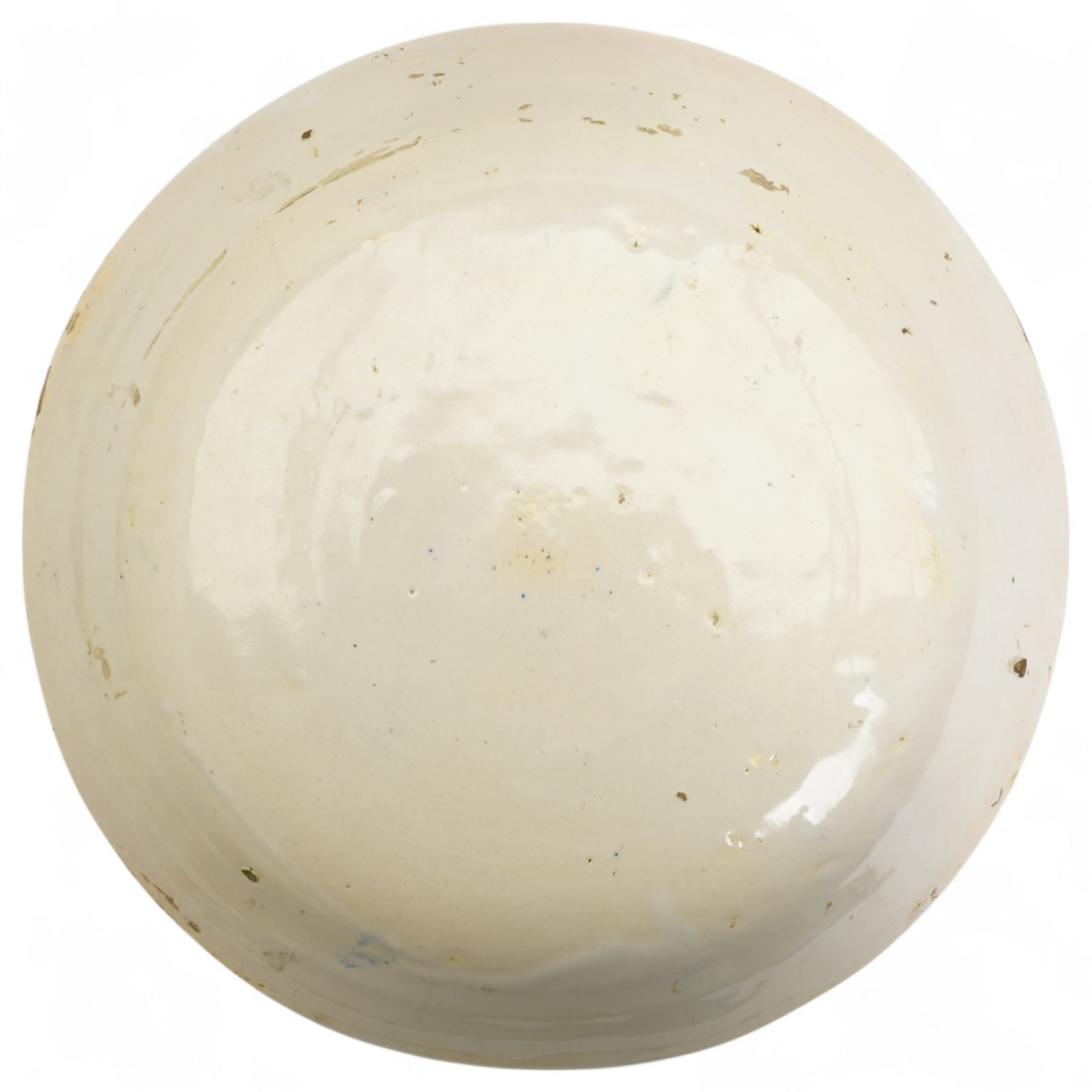 Spanish 18th century majolica bowl, possibly Talvera, decorated with orange flowers among blue decoration on a cream ground, D28cm 