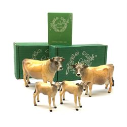 A Beswick Jersey Bull, Jersey Cow, and two Jersey Calves, three with maker's boxes, each with printed mark beneath. 