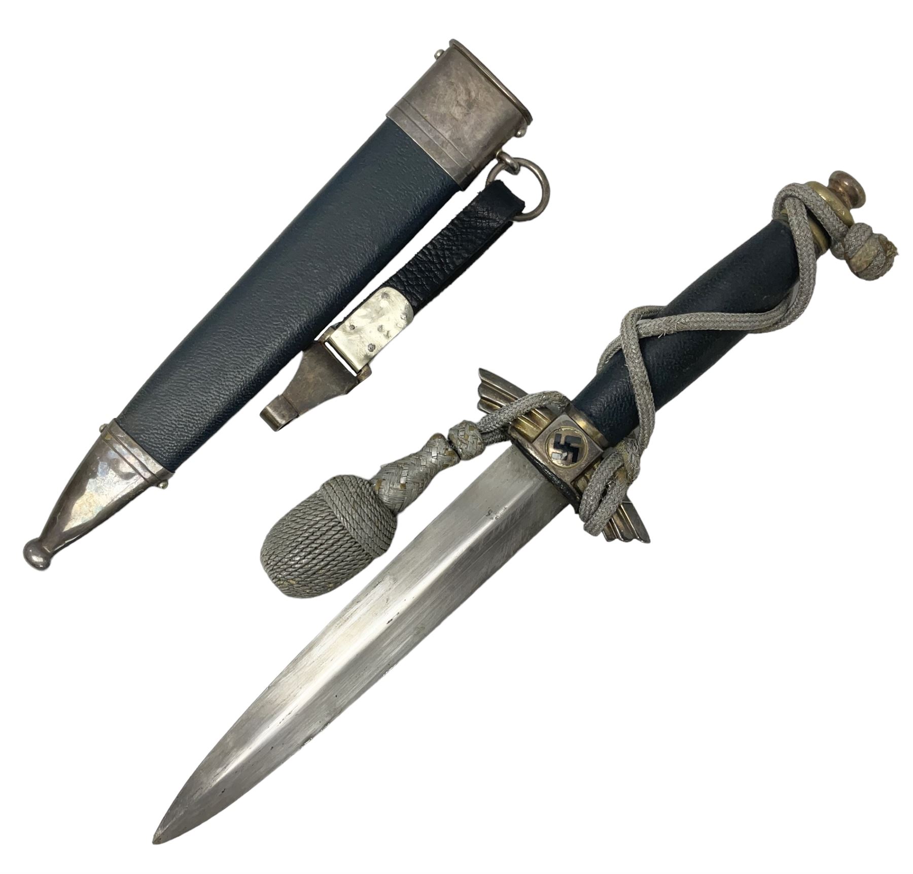German Paul Weyersberg & Co Solingen DLV flyers dagger with 18cm steel blade, plated brass/tombac downswept cross-piece and pommel and leather covered grip, in leather and plated brass/tombac scabbard with leather hanger strap and silvered knot L35cm overall. Auctioneer's Note: After WWI Germany was forbidden an air force by the Treaty of Versailles however the Deutscher Luftsport-Verband (German Air-sport Association) was formed in March 1933 from various sports flying clubs and had branches for aeroplane, gliding and balloon flying. Under cover of the sporting DLV, many future Luftwaffe pilots trained to fly. DLV was embodied with the NSKK in March 1935 and on 1st March 1937 Luftwaffe was formed.