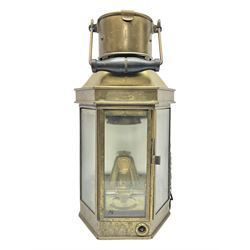 Large brass maritime lamp by Griffiths & Sons Birmingham with swing handle, threaded mounting bracket and associated oil burner, H41cm excluding handle