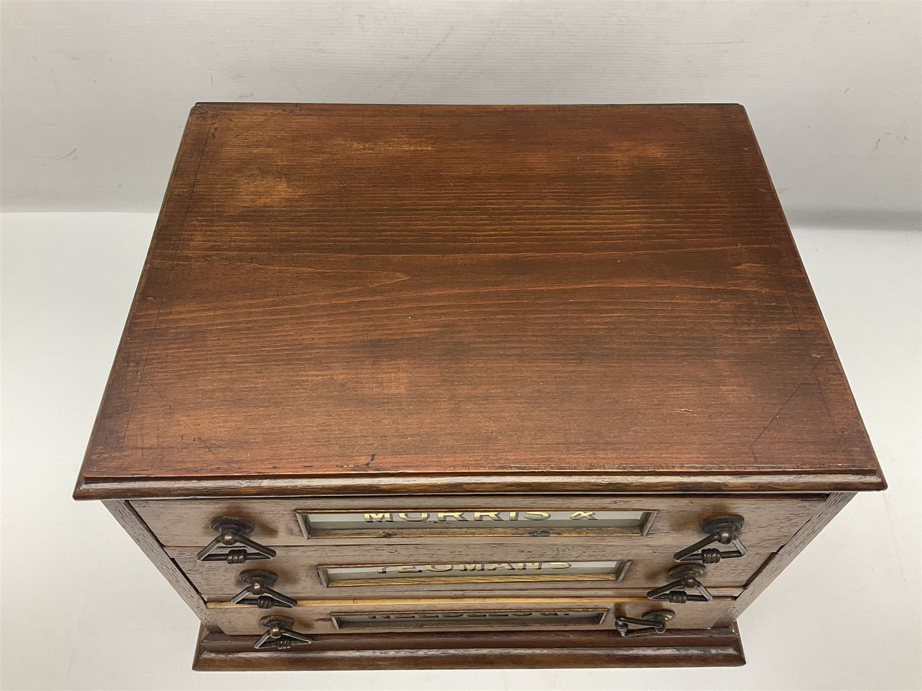 Victorian oak three drawer tabletop haberdashery chest advertising Morris Yeomans' Needles and Co, H27cm, L36cm