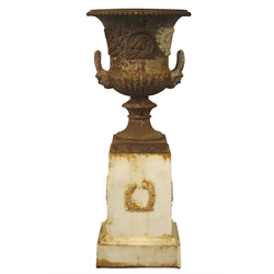  Large cast iron urn, gadrooned top and scroll body with lions mask handles, on wreath cast tapering square pedestal, H140cm, W59cm  