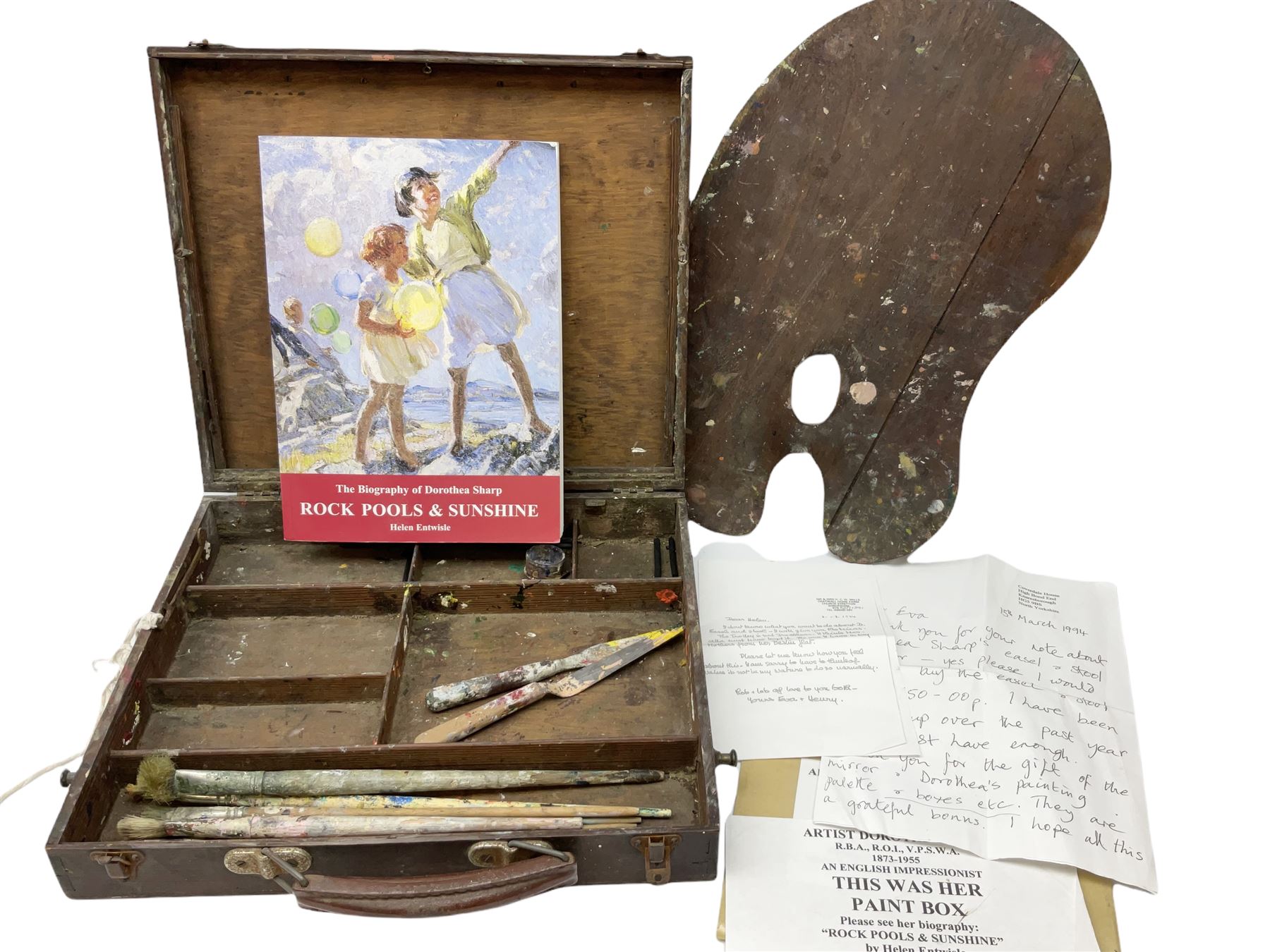 Dorothea Sharp ROI RBA (1874-1955): 20th century mahogany artist's box from Sharp's London studio, including contents: brushes and pallet knives, together with a studio palette, The Biography of Dorothea Sharp, Rock Pools & Sunshine by Helen Entwisle, and copies of two letters relating to the acquisition of the artist's box.

Provenance: Acquired alongside the purchase of other items from Sharp's Studio from Mr & Mrs Mills by Biographer Helen Entwisle in 1994). Later purchased by the current vendor along with other items from Entwisle who currently lives in Knaresborough. (Part sold at Lanes in Cornwall). 
