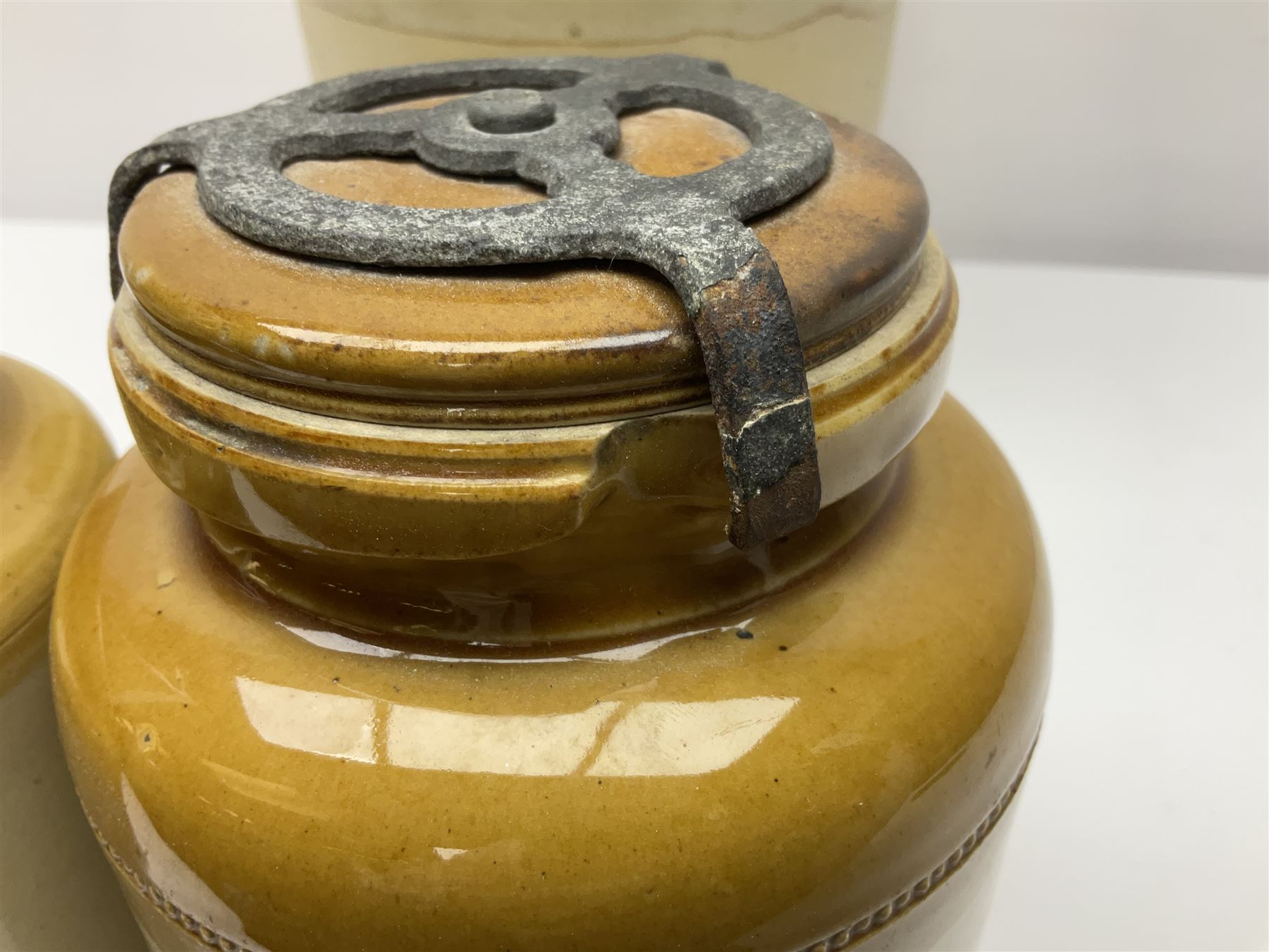 Large 2 gallon stoneware flagon, stamped 'John Soulby Wine Merchant Malton 2 Gall', together with a collection of similar stoneware jars and bottles, largest H40.5cm