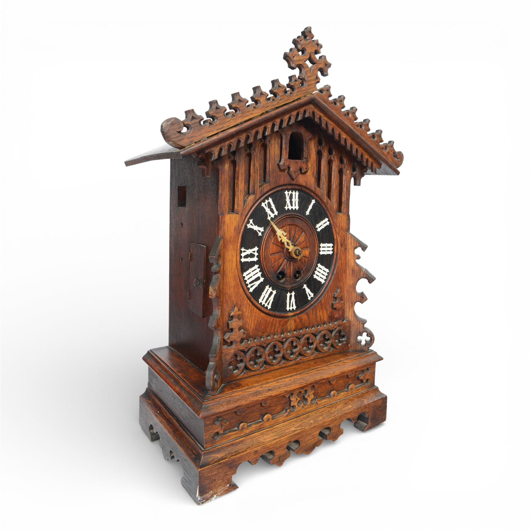 19th century Black Forest cuckoo mantel clock with carved architectural case, with eight day gong striking movement