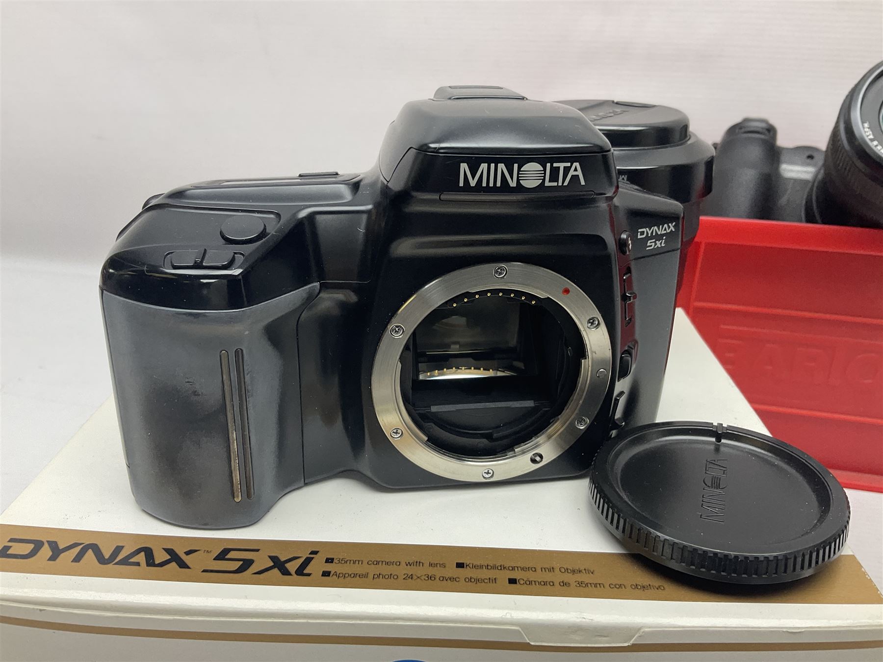 Minolta Dynax 5xi camera body serial no 17222646 with 'AF Zoom Xi 28-80mm 1:4(22)-56' lens serial no 17220881, Minolta SRT101 camera body serial 1944687, Lumix camera body serial no K6SC10168 etc 