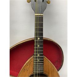 Early 20th century Italian Rafaele Disantino eight-string mandolin with two-piece back and spruce top with stamped Rafaele Disantino signature; bears maker's label L61cm; in wooden carrying case