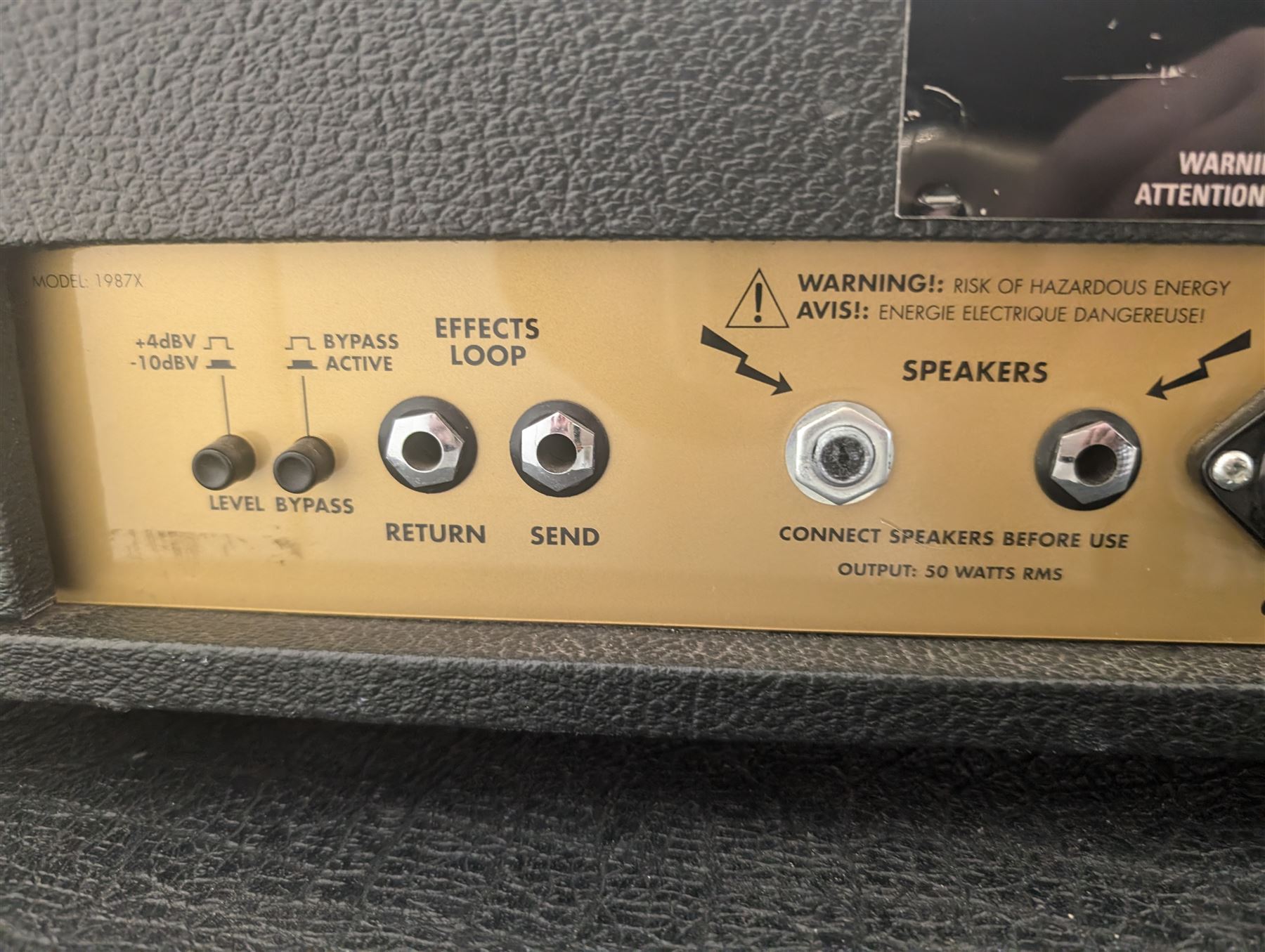 Marshall 1987X 50 watt plexi guitar amplifier head with master volume modification (screwdriver control on back), together with a Marshall 1960 4 x 12 speaker cabinet on casters, head H25cm, W65cm, cab H83cm, W76cm