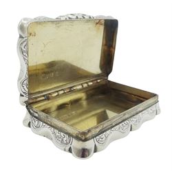 Victorian silver snuff box, of oblong scalloped form with engraved foliate scrolls surrounding a vacant oval panel, hallmarked George Unite & Sons, Birmingham 1892, L6.5cm, approximate weight 1.70 ozt (53 grams)