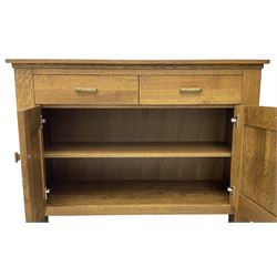 20th century medium oak sideboard, fitted with two drawers over two panelled cupboards, on square feet