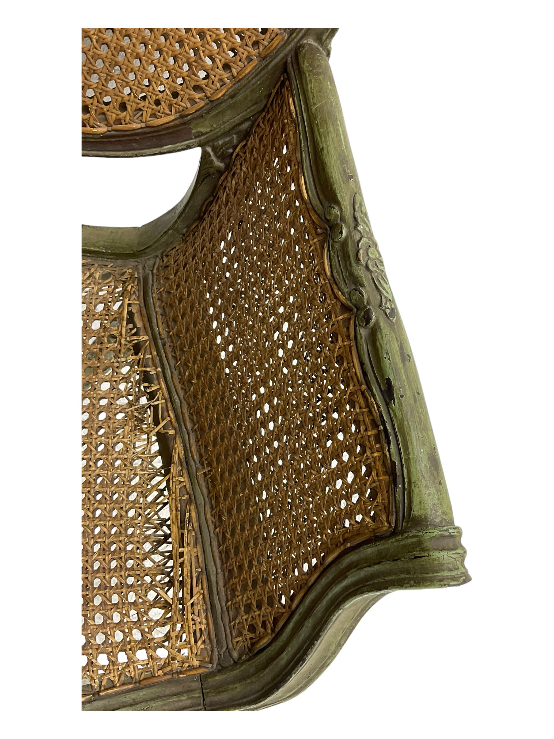 19th century French Louis XV-design armchair, carved and painted wood frame, caned back and seat with scrolled arms, supported by cabriole supports with acanthus leaf decoration