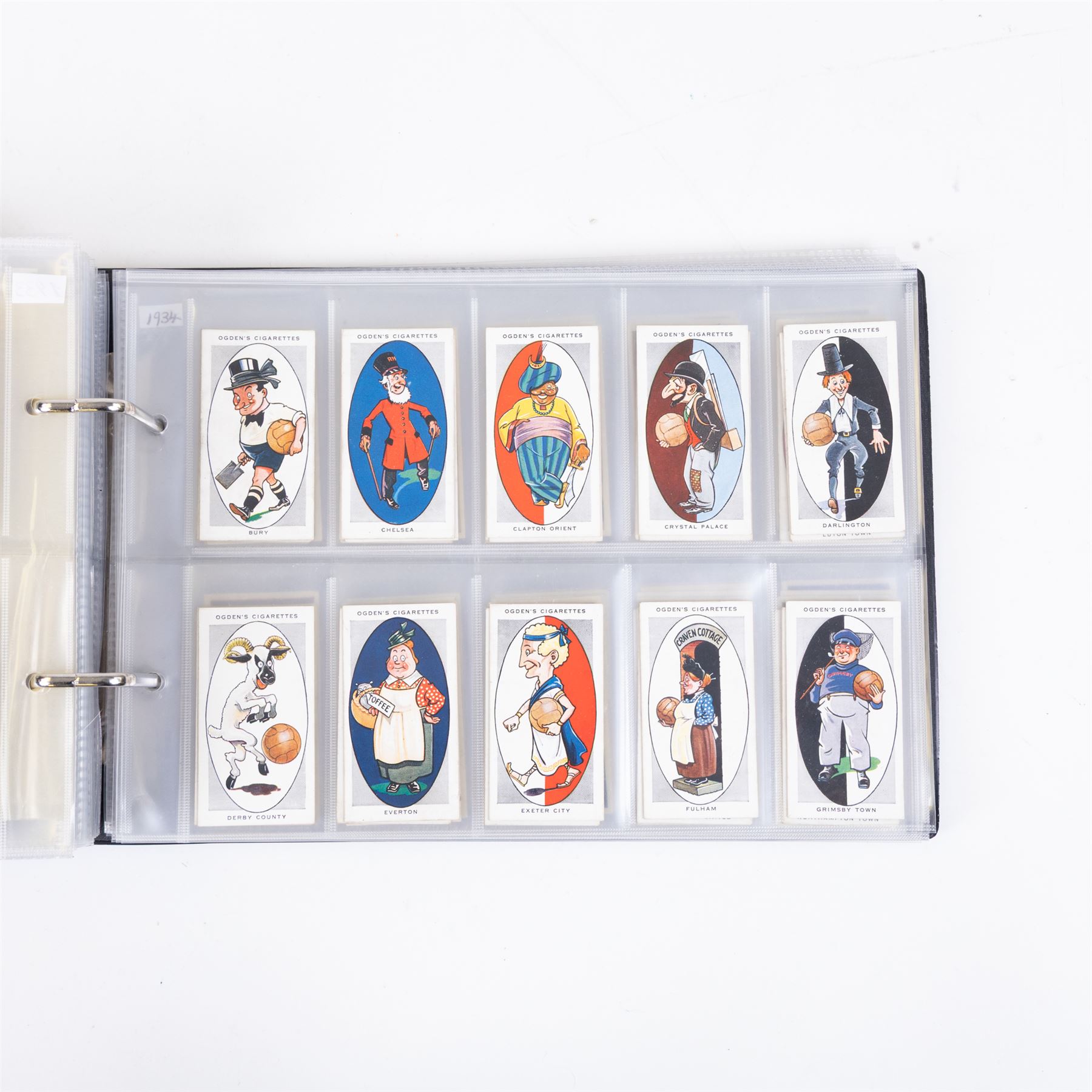 Collection of Edwardian and later Football related trading and cigarette cards, including forty-nine of fifty 1906 Ogden's Football Club Colours, 1922 PALS Footall series, ninety of one hundred 1925 Gallaher Famous Footballers, complete set of forty-four 1926 Ogden's Captains of Association Football Clubs and Colours, complete set of fifty 1927 Players Football Caricatures by MAC,  complete set of fifty 1927 Players Football Caricatures by RIP,  complete set of fifty 1930 Players Association Cup Winners, complete set of 50 1933 Ogdens AFC Nicknames etc, housed in brown cigarette card album