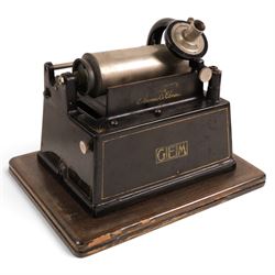 Early 20th century Edison GEM phonograph, in oak case, serial number G72256, with brass and black horn and a collection of wax cylinders