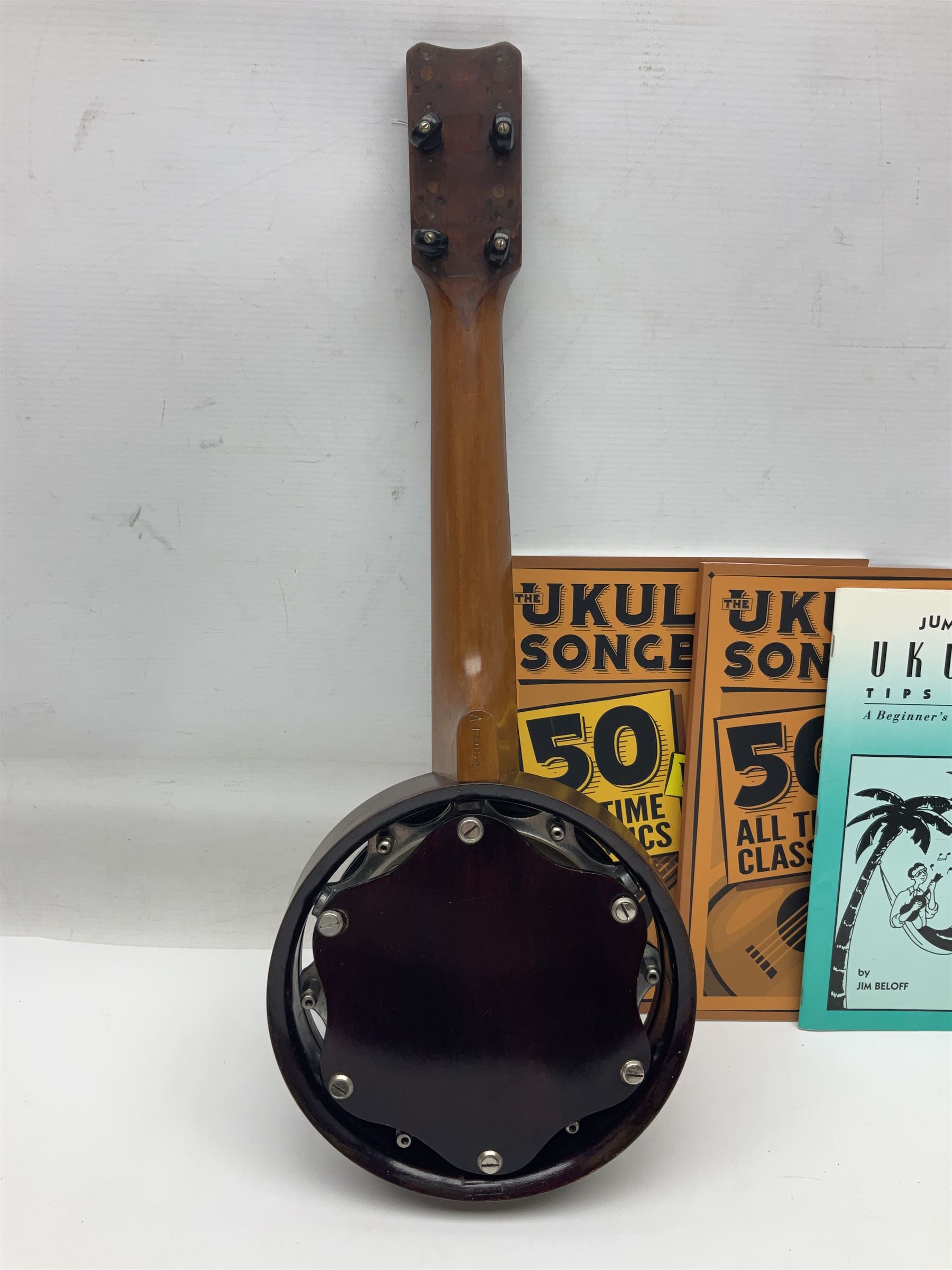 W.D. Keech banjolele pat.219720/23 with etched signature to the back; serial no.A12082 L55cm; and a restored Italian mandolin with segmented lute back; together with three music books