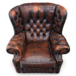 Georgian design Chesterfield lounge suite, comprising highbacked four seat sofa and pair armchairs, upholstered in chocolate brown leather, Armchairs (H 90cm, W 91cm) Sofa (H 91cm, W 238cm)
