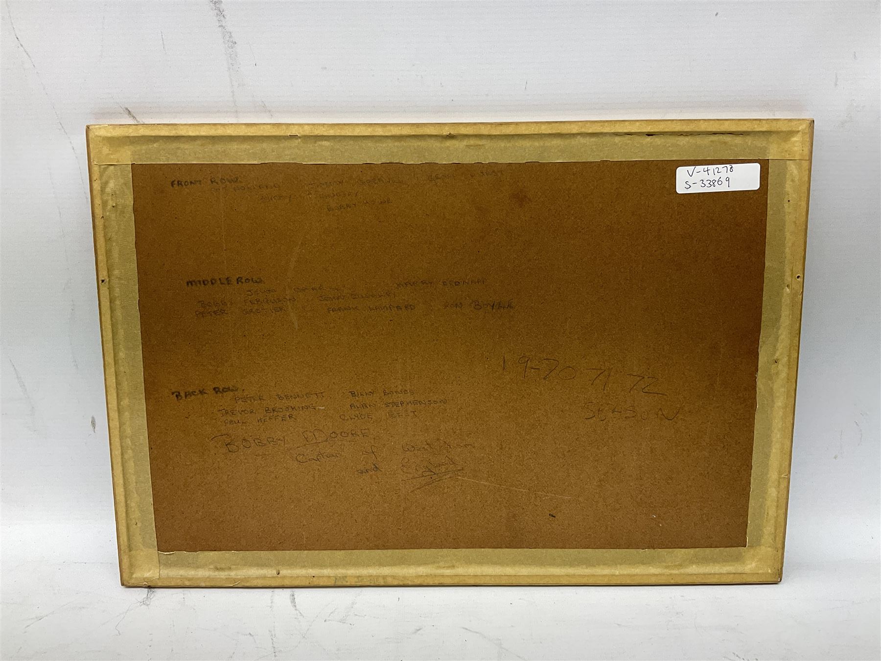 1970-1 photograph of West Ham United FC squad members, including Bobby Moore, Geoff Hurst, Harry Redknapp, Trevor Brooking, Jimmy Greaves, Billy Bonds etc, most players with signatures, 30 x 45cm, framed and glazed